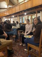 Enjoying food and conversation at One Connection Church.